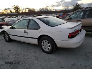 1995 Ford Thunderbird LX with VIN 1FALP62W3SH119037, listed as a Copart auction lot 41517485 with 164,133 mi miles and Salvage Title. Bid and sale history available at carsss.com. Image 2.
