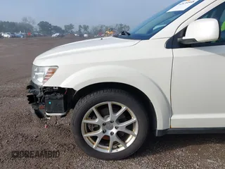 2013 Dodge Journey Crew with VIN 3C4PDCDG0DT591533, listed as a IAAI auction lot 42630548 with 164,961 mi miles and . Bid and sale history available at DreamBid. Image 18.