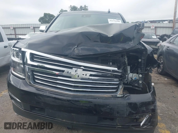 2018 Chevrolet Suburban Premier with VIN 1GNSCJKC9JR100504, listed as a IAAI auction lot 42276280 with 153,916 mi miles and . Bid and sale history available at DreamBid. Image 12.
