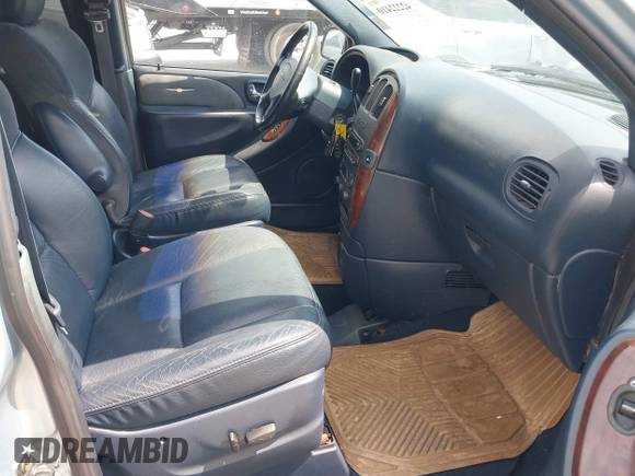 2002 Chrysler Town & Country Limited with VIN 2C8GP64L52R609030, listed as a IAAI auction lot 42222410 with 117,613 mi miles and . Bid and sale history available at DreamBid. Image 5.