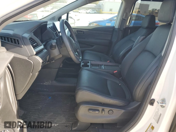 2024 Honda Odyssey EX-L z VIN 5FNRL6H65RB047405, wystawiony jako Copart lot #57880245 z przebiegiem Nie podano mil oraz Czysty tytuł • Clean title. Historia ofert i sprzedaży dostępna na DreamBid. Obrazek 7.