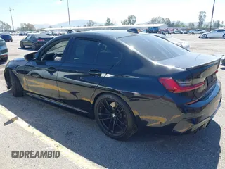2020 BMW 3 Series M340i with VIN WBA5U7C04LFH33037, listed as a IAAI auction lot 41872419 with 68,065 mi miles. Bid and sale history available at carsss.com. Image 3.