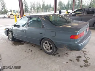 2000 Toyota Camry CE with VIN 4T1BG22KXYU923956, listed as a IAAI auction lot 41937950 with 101,539 mi miles. Bid and sale history available at carsss.com. Image 3.