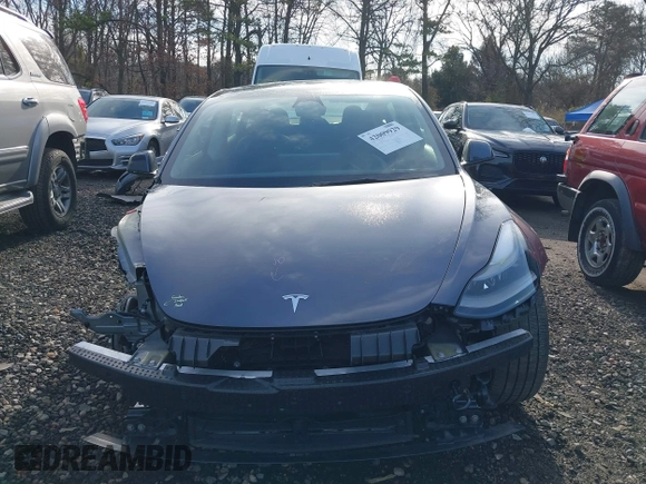 2023 Tesla Model 3 with VIN 5YJ3E1EAXPF666252, listed as a IAAI auction lot 42009929 with 27,328 mi miles and . Bid and sale history available at DreamBid. Image 13.
