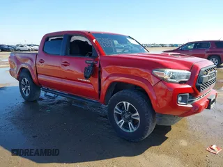 2017 Toyota Tacoma SR5 z VIN 5TFCZ5ANXHX096877, wystawiony jako IAAI lot #41037068 z przebiegiem 81 466 mil mil oraz . Historia ofert i sprzedaży dostępna na DreamBid. Obrazek 1.