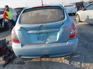 2008 Hyundai Accent GS with VIN KMHCM36C68U103086, listed as a IAAI auction lot 41792536 with 100,721 mi miles. Bid and sale history available at carsss.com. Image 6.