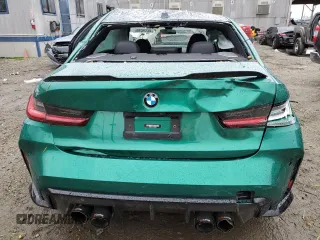 2023 BMW M3 with VIN WBS53AY06PFP08079, listed as a Copart auction lot 48228285 with 9,869 mi miles and Salvage title. Bid and sale history available at DreamBid. Image 6.