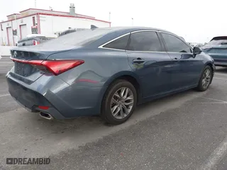 2019 Toyota Avalon XLE with VIN 4T1BZ1FB3KU033885, listed as a IAAI auction lot 41774796 with 77,835 mi miles. Bid and sale history available at carsss.com. Image 4.