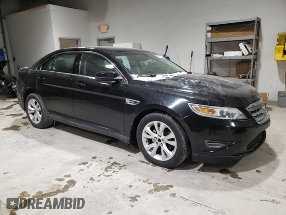 2011 Ford Taurus SEL with VIN 1FAHP2EW5BG140536, listed as a Copart auction lot 88628235 with 165,037 mi miles and Salvage Title. Bid and sale history available at carsss.com. Image 4.