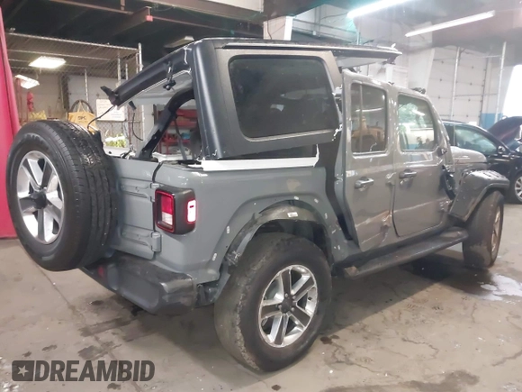 2022 Jeep Wrangler Unlimited Sahara with VIN 1C4HJXENXNW251089, listed as a IAAI auction lot 41728817 with 48,438 mi miles and . Bid and sale history available at DreamBid. Image 4.