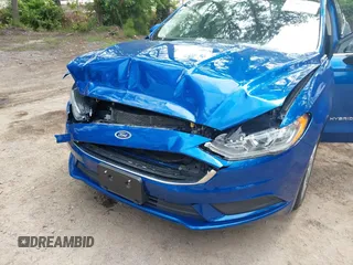 2017 Ford Fusion Hybrid SE with VIN 3FA6P0LU1HR162662, listed as a IAAI auction lot 42465793 with 116,414 mi miles and . Bid and sale history available at DreamBid. Image 6.