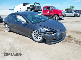 2023 Tesla Model 3 with VIN 5YJ3E1EAXPF617388, listed as a IAAI auction lot 42218748 with Not provided miles and . Bid and sale history available at DreamBid. Image 6.