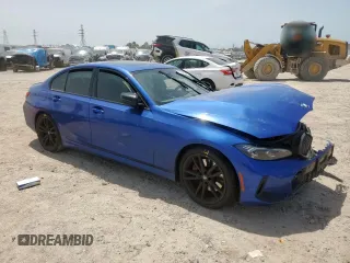 2023 BMW 3 Series 330i with VIN 3MW69FF00P8D04288, listed as a Copart auction lot 57181315 with 35,461 mi miles and Salvage title. Bid and sale history available at DreamBid. Image 4.