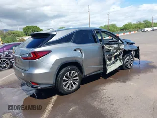 2020 Lexus RX with VIN 2T2HZMAA9LC163081, listed as a IAAI auction lot 41627232 with 38,153 mi miles. Bid and sale history available at carsss.com. Image 4.