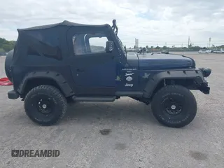 1997 Jeep Wrangler Sport with VIN 1J4FY19S2VP481780, listed as a IAAI auction lot 41822213 with 156,629 mi miles. Bid and sale history available at carsss.com. Image 13.