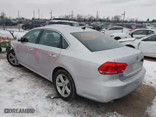 2013 Volkswagen Passat SE w/Sunroof with VIN 1VWBH7A35DC005005, listed as a IAAI auction lot 41150825 with 90,467 mi miles. Bid and sale history available at carsss.com. Image 3.