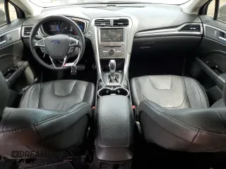 2016 Ford Fusion Titanium with VIN 3FA6P0SU7GR349548, listed as a Copart auction lot 53116325 with 124,354 mi miles and Salvage title. Bid and sale history available at DreamBid. Image 8.