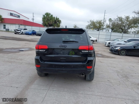 2018 Jeep Grand Cherokee Laredo E with VIN 1C4RJFAG7JC312948, listed as a IAAI auction lot 41624027 with 116,763 mi miles. Bid and sale history available at carsss.com. Image 17.