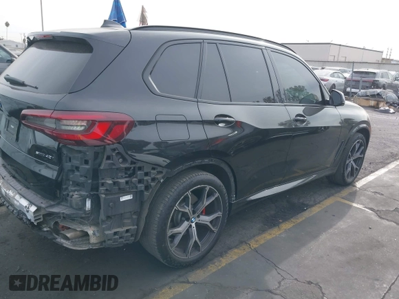 2022 BMW X5 sDrive40i with VIN 5UXCR4C07N9J90418, listed as a IAAI auction lot 40994119 with 50,011 mi miles. Bid and sale history available at carsss.com. Image 4.