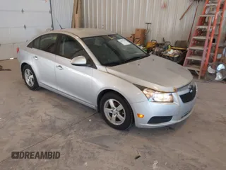 2014 Chevrolet Cruze 1LT с VIN 1G1PC5SB2E7296549, выставлен на аукционе IAAI как лот 42797744 с пробегом 137 343 миль миль и . История ставок и продаж доступна на DreamBid. Изображение 1.