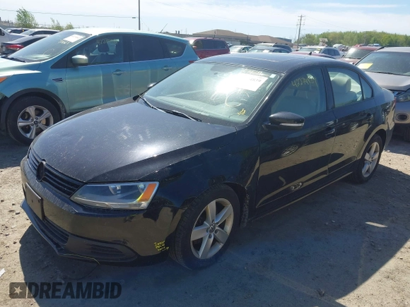 2012 Volkswagen Jetta TDI w/Premium & Nav z VIN 3VWLL7AJ7CM400382, wystawiony jako IAAI lot #42274839 z przebiegiem 150 205 mil mil oraz . Historia ofert i sprzedaży dostępna na DreamBid. Obrazek 2.