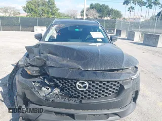 2023 Mazda CX-50 S Premium Plus with VIN 7MMVABEM1PN141344, listed as a IAAI auction lot 41473823 with 12,120 mi miles and . Bid and sale history available at DreamBid. Image 12.
