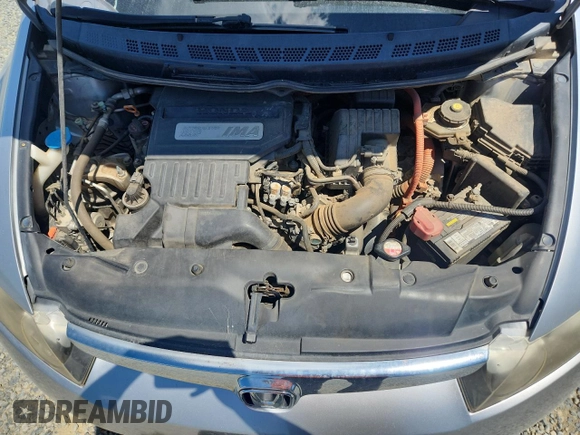 2006 Honda Civic z VIN JHMFA36246S007899, wystawiony jako Copart lot #58080595 z przebiegiem 222 699 mil mil oraz Szkoda całkowita • Salvage title. Historia ofert i sprzedaży dostępna na DreamBid. Obrazek 11.