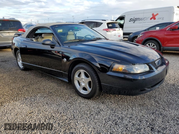 2004 Ford Mustang Deluxe with VIN 1FAFP44414F125267, listed as a Copart auction lot 74595714 with 0 mi miles and Salvage Title. Bid and sale history available at carsss.com. Image 4.