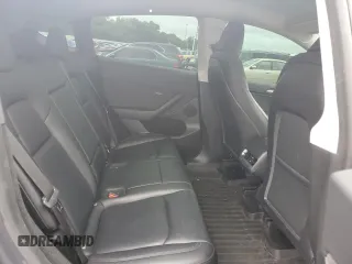 2023 Tesla Model Y Long Range z VIN 7SAYGDEE4PF752292, wystawiony jako Copart lot #53824185 z przebiegiem 61 470 mil mil oraz Szkoda całkowita • Salvage title. Historia ofert i sprzedaży dostępna na DreamBid. Obrazek 10.