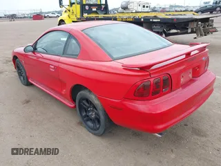 1996 Ford Mustang z VIN 1FALP4045TF183390, wystawiony jako IAAI lot #42361063 z przebiegiem 163 194 mil mil oraz . Historia ofert i sprzedaży dostępna na DreamBid. Obrazek 3.