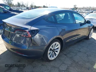 2022 Tesla Model 3 with VIN 5YJ3E1EA8NF241691, listed as a IAAI auction lot 41742584 with 70,375 mi miles and . Bid and sale history available at DreamBid. Image 4.