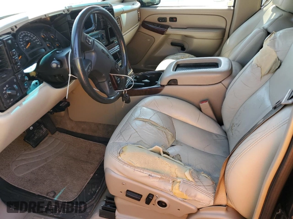 2004 GMC Yukon SLT z VIN 1GKEK13Z64R319621, wystawiony jako Copart lot #59622995 z przebiegiem 228 726 mil mil oraz Szkoda całkowita • Salvage title. Historia ofert i sprzedaży dostępna na DreamBid. Obrazek 7.