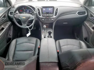 2021 Chevrolet Equinox Premier z VIN 2GNAXNEV9M6136701, wystawiony jako Copart lot #57288215 z przebiegiem 62 808 mil mil oraz Szkoda całkowita • Salvage title. Historia ofert i sprzedaży dostępna na DreamBid. Obrazek 8.