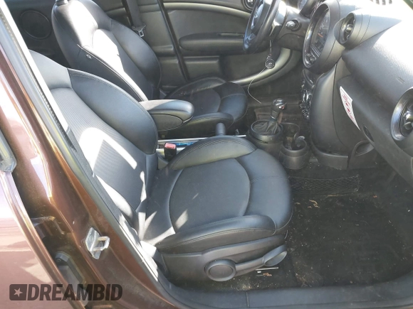 2015 MINI Countryman S z VIN WMWZC5C55FWP47826, wystawiony jako IAAI lot #41342674 z przebiegiem 94 683 mil mil oraz . Historia ofert i sprzedaży dostępna na DreamBid. Obrazek 5.