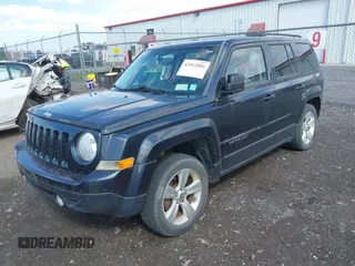 2014 Jeep Patriot Latitude with VIN 1C4NJRFB1ED846282, listed as a IAAI auction lot 41912886 with 107,657 mi miles. Bid and sale history available at carsss.com. Image 2.