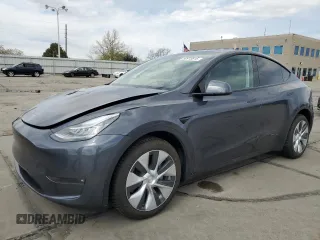 2022 Tesla Model Y Long Range z VIN 7SAYGDEE2NF443711, wystawiony jako Copart lot #50913815 z przebiegiem 19 700 mil mil oraz Szkoda całkowita • Salvage title. Historia ofert i sprzedaży dostępna na DreamBid. Obrazek 1.
