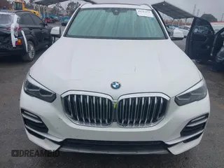 2021 BMW X5 sDrive40i with VIN 5UXCR4C03M9F24817, listed as a IAAI auction lot 41512172 with 54,867 mi miles. Bid and sale history available at carsss.com. Image 12.