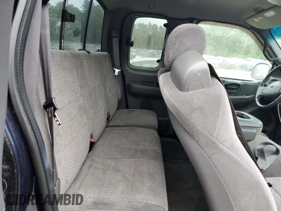 2002 Ford F-150 XL z VIN 1FTRX18L02NA96421, wystawiony jako Copart lot #64867095 z przebiegiem 135 401 mil mil oraz Czysty tytuł • Clean title. Historia ofert i sprzedaży dostępna na DreamBid. Obrazek 10.