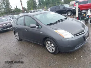 2008 Toyota Prius z VIN JTDKB20U283456092, wystawiony jako IAAI lot #42354007 z przebiegiem 125 327 mil mil oraz . Historia ofert i sprzedaży dostępna na DreamBid. Obrazek 1.
