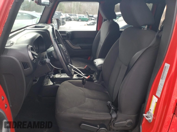 2015 Jeep Wrangler Unlimited Willys Wheeler with VIN 1C4BJWDG2FL542045, listed as a Copart auction lot 52903465 with 86,205 mi miles and Clean Title. Bid and sale history available at DreamBid. Image 7.