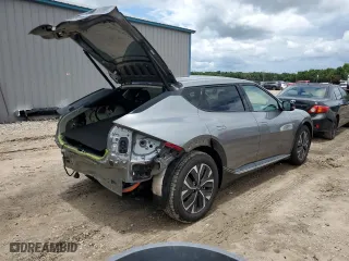 2022 Kia EV6 Wind with VIN KNDC34LA8N5029594, listed as a Copart auction lot 61707524 with 59,367 mi miles and Salvage Title. Bid and sale history available at carsss.com. Image 3.