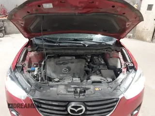 2016 Mazda CX-5 Grand Touring with VIN JM3KE4DY6G0690923, listed as a IAAI auction lot 41875553 with 179,489 mi miles. Bid and sale history available at carsss.com. Image 10.