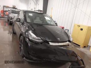 2021 Tesla Model Y Long Range with VIN 5YJYGAEE5MF305655, listed as a IAAI auction lot 41860993 with 50,750 mi miles. Bid and sale history available at carsss.com. Image 12.