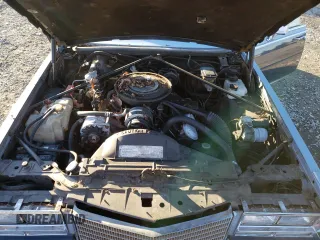 1984 Cadillac Seville z VIN 1G6AS6987EE810927, wystawiony jako Copart lot #42836105 z przebiegiem 19 894 mil mil oraz Tytuł czysty. Historia ofert i sprzedaży dostępna na DreamBid. Obrazek 11.