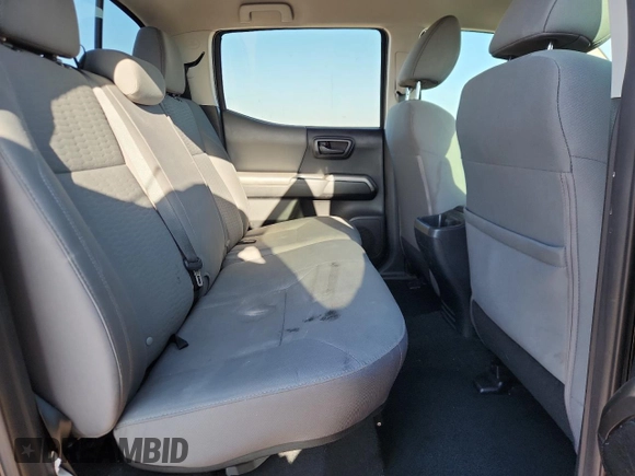 2018 Toyota Tacoma SR5 с VIN 3TMAZ5CN5JM066282, выставлен на аукционе Copart как лот 61197145 с пробегом 85 916 миль миль и Списание • Salvage title. История ставок и продаж доступна на DreamBid. Изображение 10.