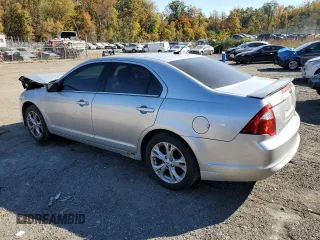 2012 Ford Fusion SE with VIN 3FAHP0HA9CR267305, listed as a Copart auction lot 77114304 with 165,781 mi miles and Salvage Title. Bid and sale history available at carsss.com. Image 2.
