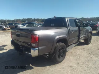 2018 Toyota Tacoma SR5 with VIN 5TFAZ5CN0JX056706, listed as a IAAI auction lot 41774141 with 31,738 mi miles and . Bid and sale history available at DreamBid. Image 4.