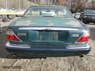 1998 Jaguar XJ with VIN SAJHX1241WC839104, listed as a Copart auction lot 81911744 with 61,956 mi miles and Clean Title. Bid and sale history available at carsss.com. Image 6.