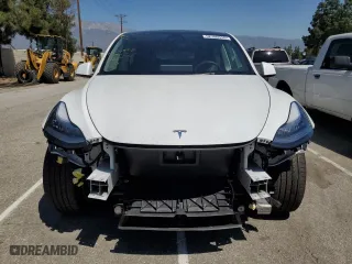 2022 Tesla Model Y Long Range with VIN 7SAYGDEE0NA020896, listed as a Copart auction lot 52780555 with 10,117 mi miles and Salvage Title. Bid and sale history available at carsss.com. Image 5.
