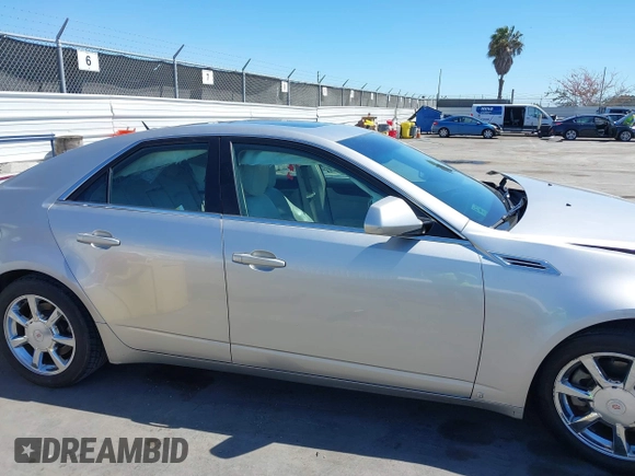 2008 Cadillac CTS RWD with VIN 1G6DM577280111413, listed as a IAAI auction lot 42238643 with 114,706 mi miles and . Bid and sale history available at DreamBid. Image 14.
